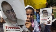 Palästinensische Kinder mit Plakaten, auf denen steht: "Freiheit für Mohammed al-Halabi". (AFP / Said Khatib)